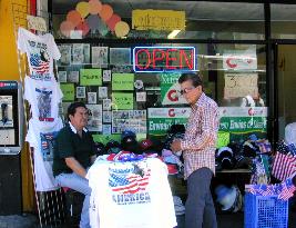 Flags, patriotic T-shirts hot sellers in downtown L.A.